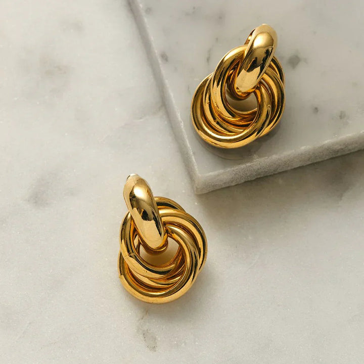 Boucles d'oreilles entrelacées | Or blanc