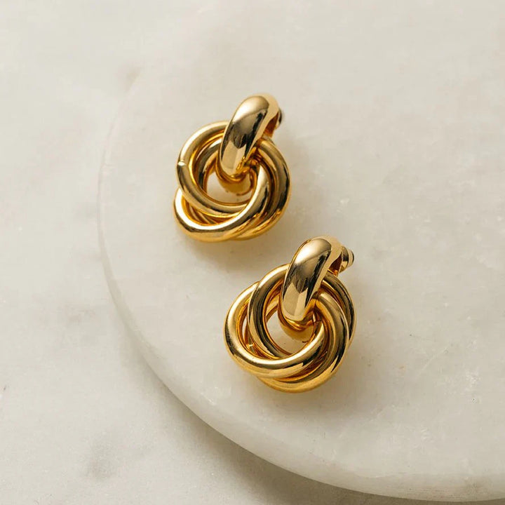 Boucles d'oreilles entrelacées | Or blanc